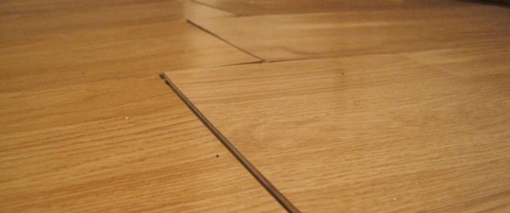 Why Is My Laminate Floor Lifting at the Edges Causes, Fixes & Prevention